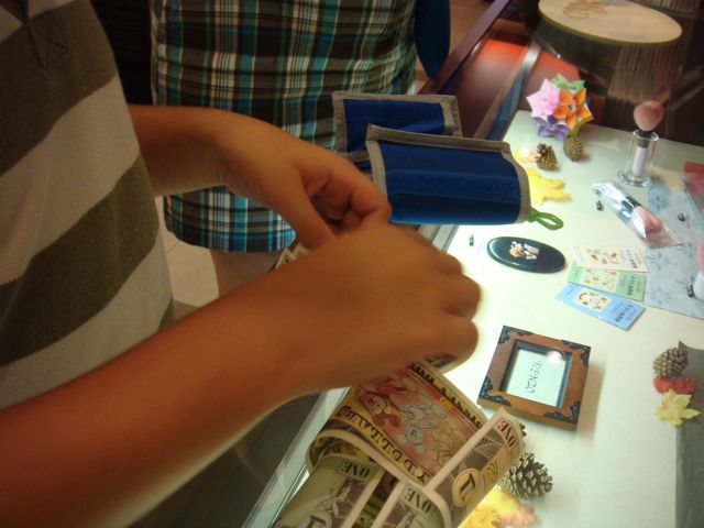 Yes, those are Disney dollars, real money in Fantasyland