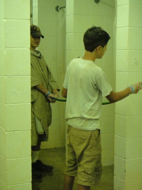 cleaning camp toilets 