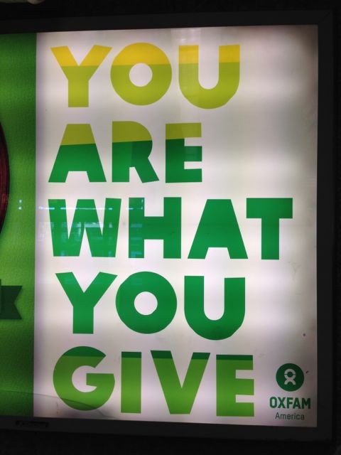 enthusiasm is slightly more contagious than the lack of enthusiasm inspiring airport advertising sign
