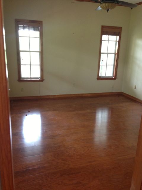 empty room with wooden floors
