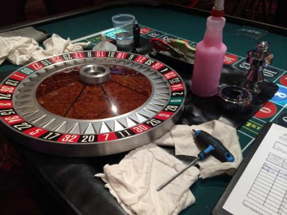 Roulette wheel being cleaned