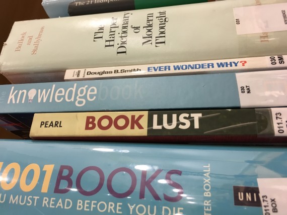 Books on a library shelf
