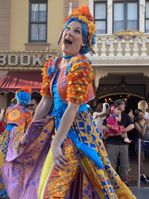 Disneyland Magic Happens parade performer