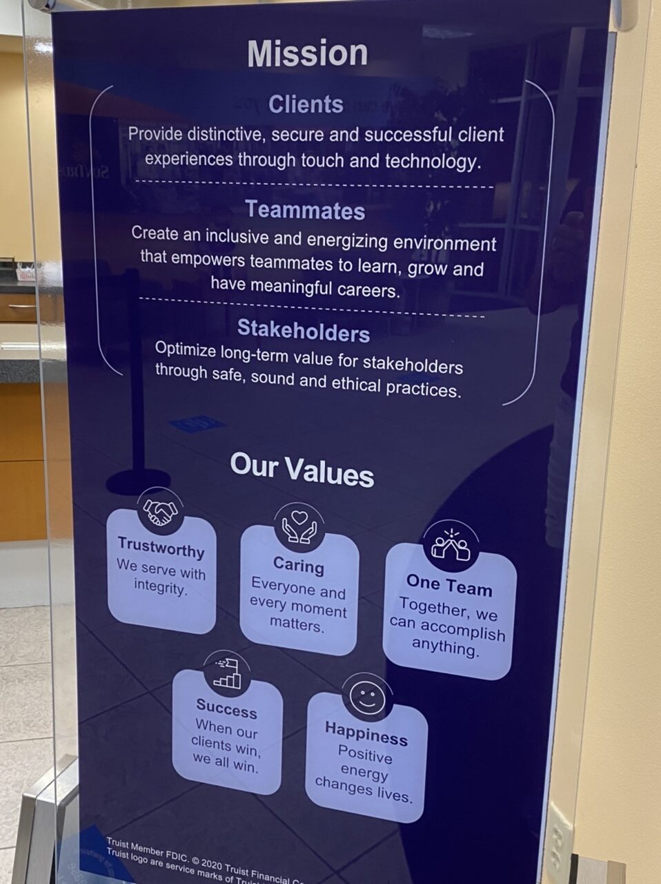 Bank lobby sign with vision and mission
