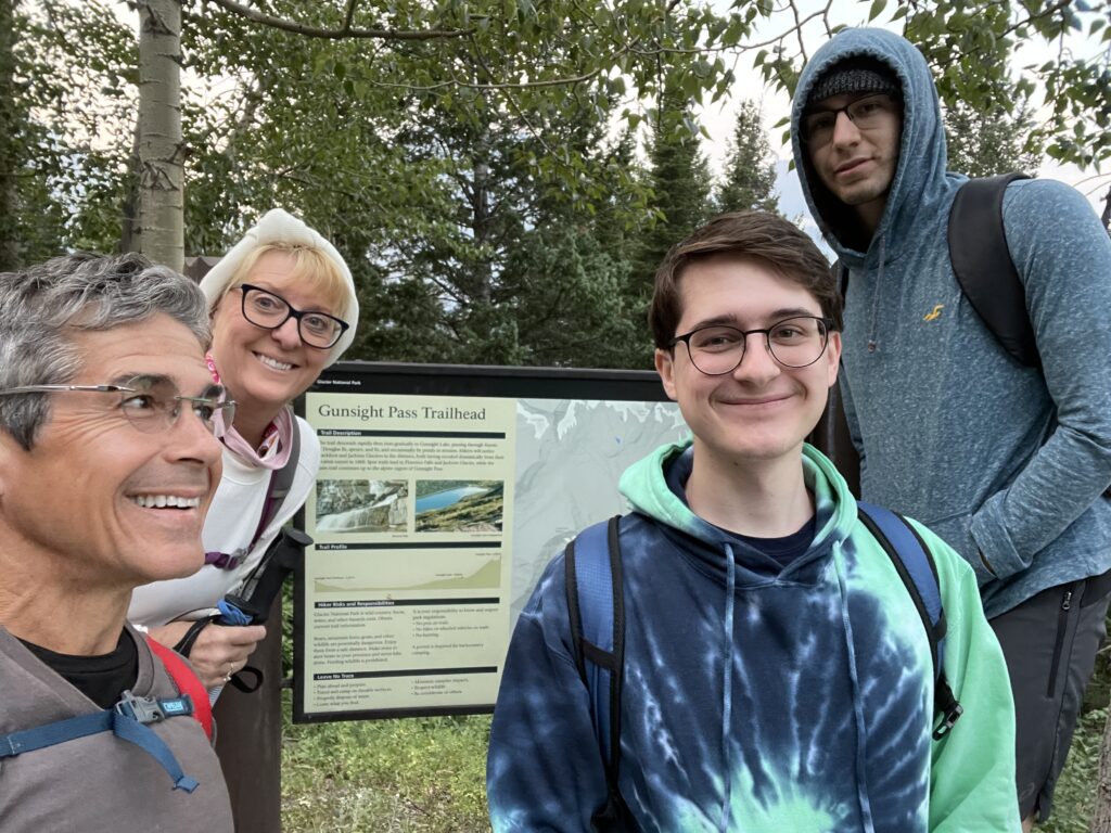 Four hikers at trailhead