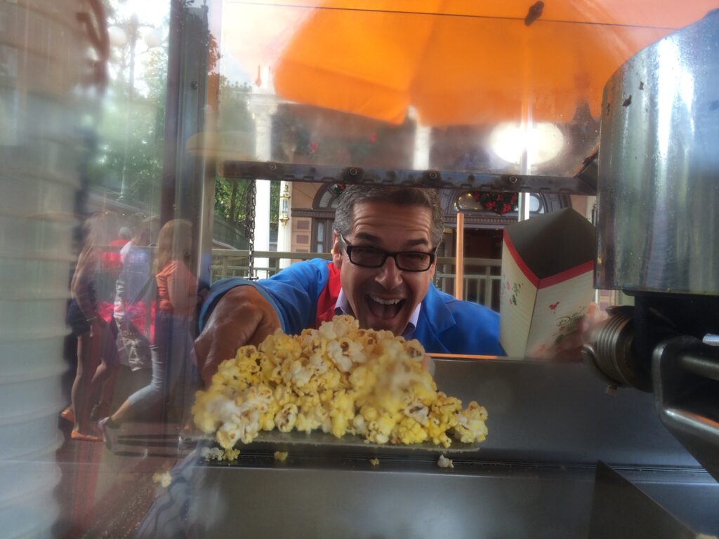 Disney Speaker Jeff Noel working at Main Street popcorn cart