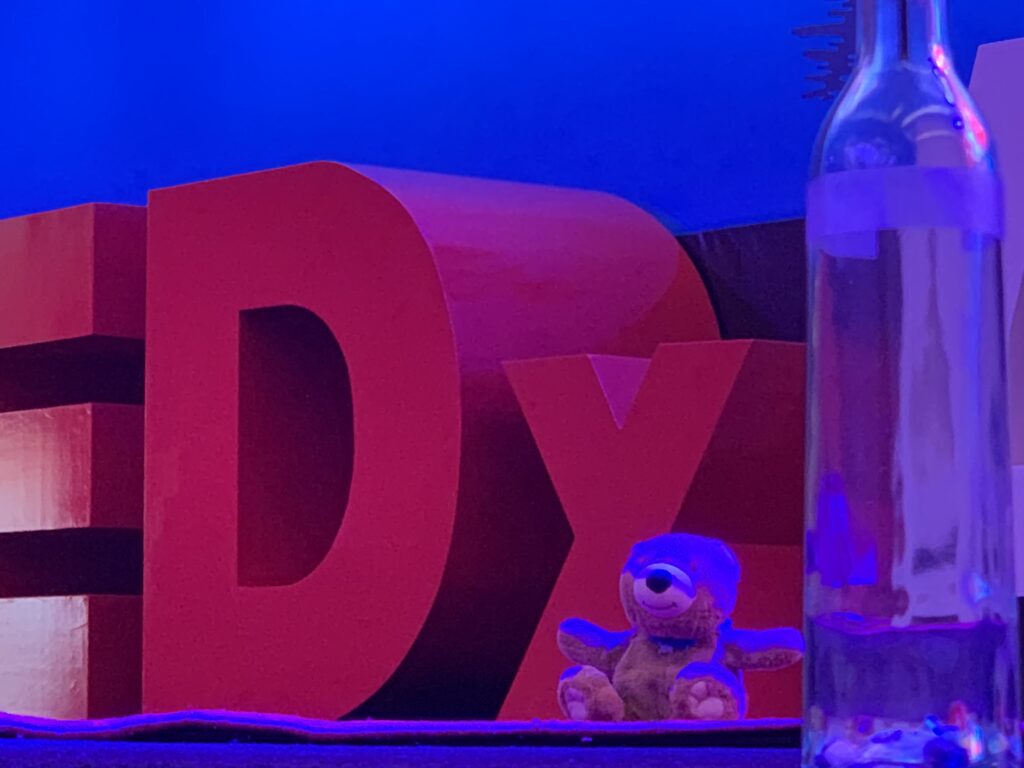 teddy bear at TEDx stage