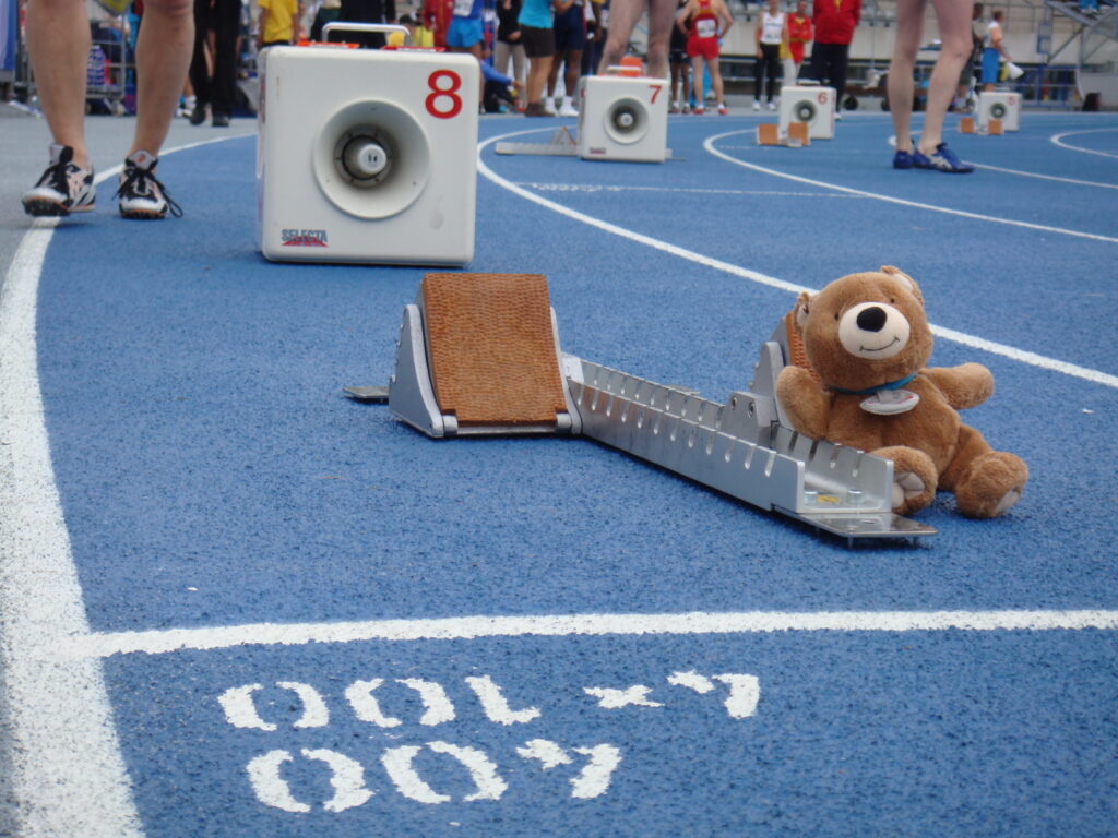 teddy bear in track starting blocks