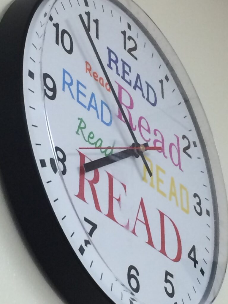 clock with the word read on the face